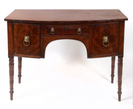 A 19th century inlaid mahogany bowfront sideboard, on ring turned legs, 123 cm wide  See illustration