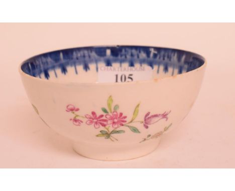 A late 18th century Lowestoft porcelain bowl, decorated flowers in enamel, restored, 11 cm diameter
