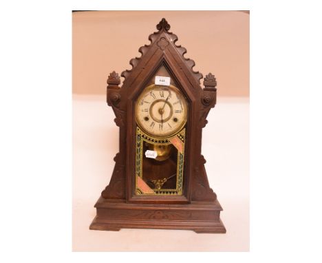 An American shelf clock, 57 cm high, and a Bakelite mantel clock, 18 cm high (2) 