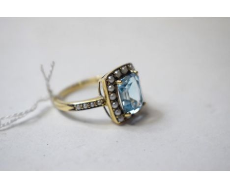 A 9ct gold, square cut blue topaz and pearl ring