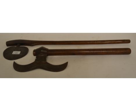 A native type axe, 66 cm and another similar (2)