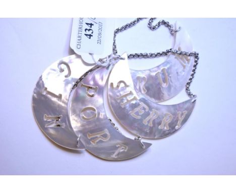 Four mother of pearl decanter labels (4)