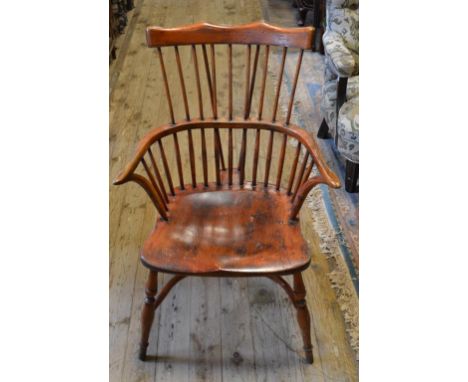 A pair of stick back kitchen armchairs, with crinoline stretchers, and a matching set of four single chairs (4 + 2) (6)