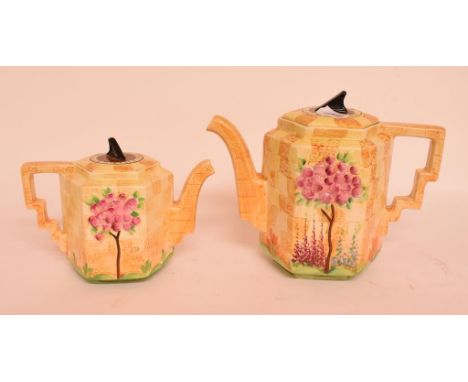 A Beswick Sundial teapot and cover, other similar items, a Carlton Ware Oak Tree pattern ewer, other oak tree pattern items, 