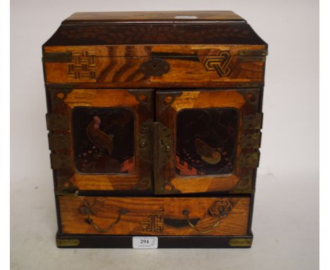 A Japanese inlaid wood and lacquer table top cabinet, the panel doors decorated chickens, 30 cm wide, a Whitefriars Glass ind