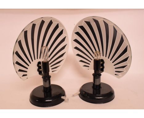 A pair of Art Deco style table lamps, with starburst glass shades, 25 cm wide, four pieces of Avebury Stone Circle Art Potter