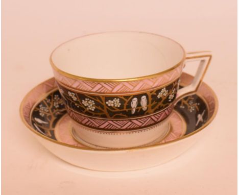 A 19th century Worcester cup and saucer, decorated doves and blossoming branches, a Parian ware bust, a Caithness paperweight