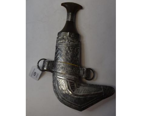 A silver coloured metal mounted jambiya, with a horn handle, and scabbard, 32 cm high