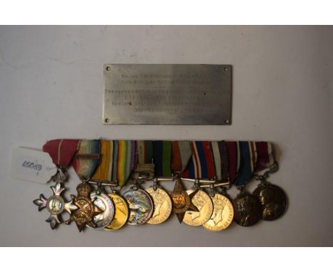 A group of eleven medals, awarded to L/Cpl - Major T H Symonds ASC - IEME, comprising MBE (Military), 1914 trio (with bar), I