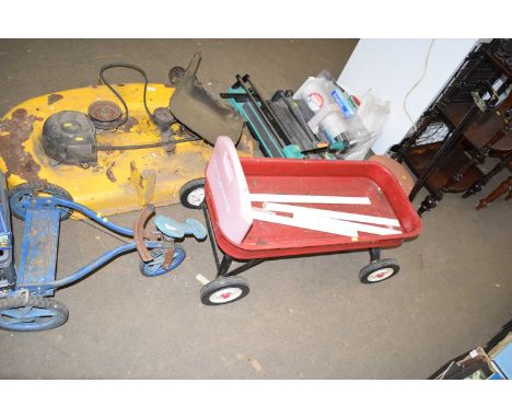 Child's hand pulley stand up tricycle together with a pull along radio flyer cart