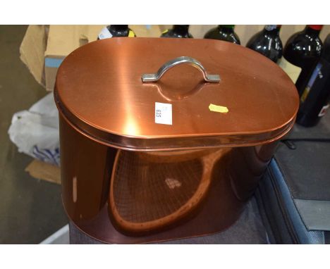Copper colour bread bin and a quantity of storage tins