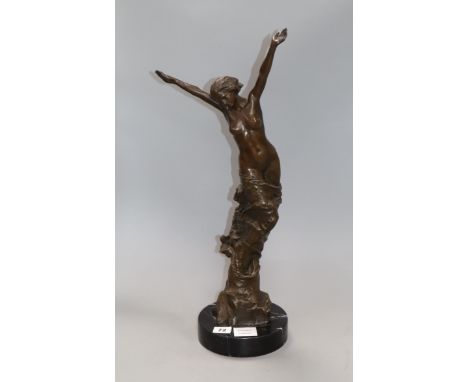A bronze female nude, signed C. Ruben height 57cm