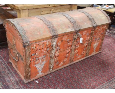 A 19th century painted iron mounted domed top trunk W.145cm