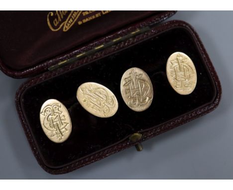 A pair of late Victorian 15ct gold oval cufflinks, by Saunders &amp; Shepherd, engraved with monogram.