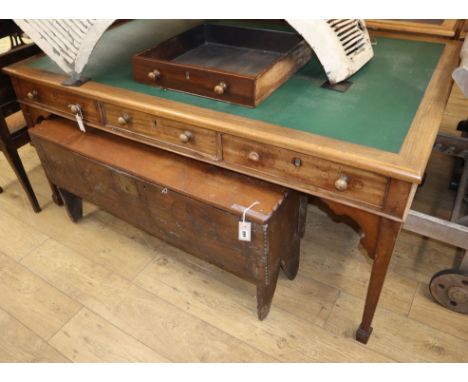 A mahogany partners' desk, fitted six drawers, on tapered legs and spade feet W.167.5cm, D.106cm