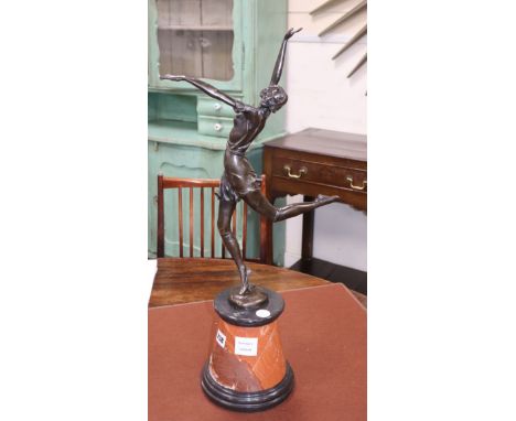 A bronze dancer, signed B. Zach, on marble base overall height 65cm