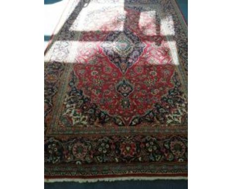 A Heriz style carpet 320 x 206cm