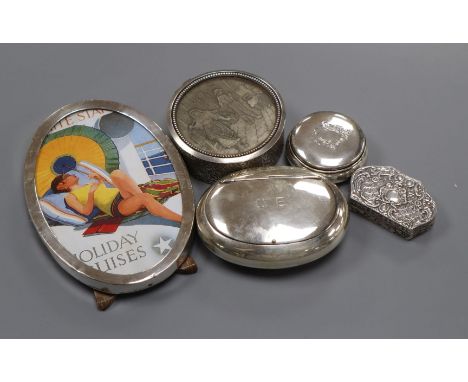 A George V silver tobacco box, a silver pill box, Italian 800 pill box, one other box and a silver mounted photograph frame.