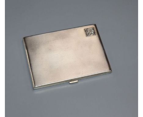 A George V engine turned silver cigarette case, Birmingham, 1930, 11.7cm.