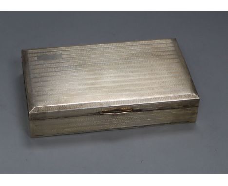 An Egyptian engine turned white metal cigarette box, 20cm.