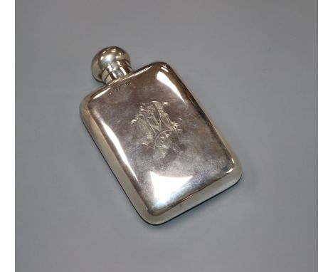 An Edwardian silver hip flask by George &amp; George Neal, London, 1905, 4 oz, 12.7cm.