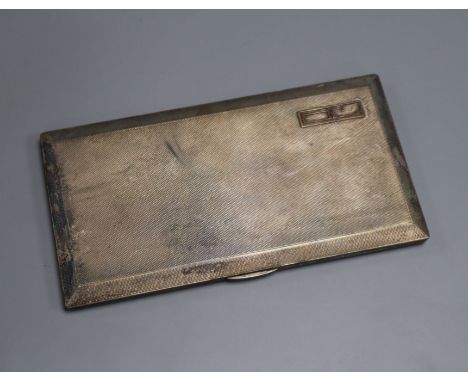 A George V engine turned silver cigarette case, Birmingham, 1922, 16.6cm, gross 10 oz.