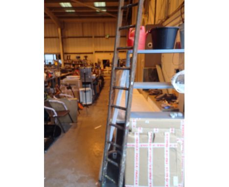 Large wooden ladder approximately 10 ft long 