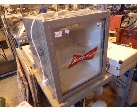 Budweiser table top bottle fridge in silver    CONDITION REPORT:  The electrical items included in this lot have been PAT tes