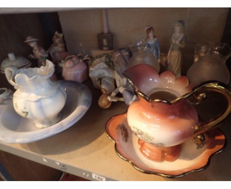 Shelf of mixed ceramics including jug and bowl sets lamps figurines etc