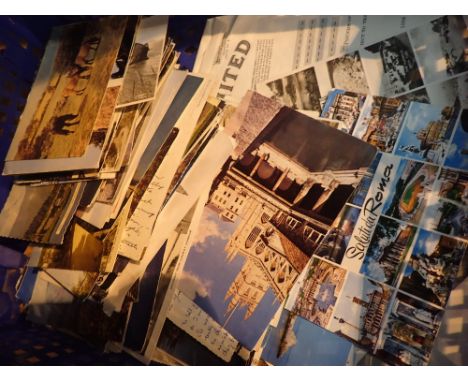 Collection of mixed postcards and share certificates