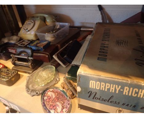 Shelf of collectables including shell case hair dryer wood plane phone paperweight slide rule tins etc 