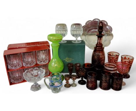 A Bohemian ruby flashed glass decanter, etched with spiralling fruiting vine, 36cm high, c.1880;&nbsp; &nbsp;two similar sher