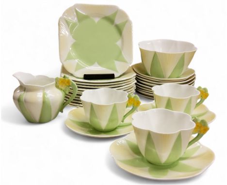 An Art Nouveau Shelley Dainty part tea service, comprising three cups, twelve saucers and side plates, milk jug and sugar bow