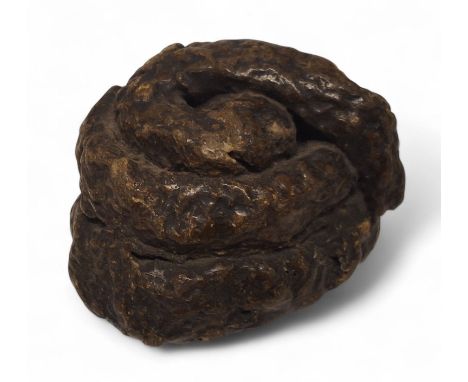 A novelty Victorian papier mache snuff box in the form of a dog poo c.1880