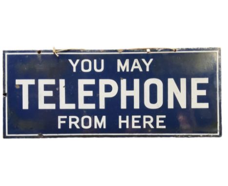 An early 20th century 'You May Telephone From Here' double sided enamel sign, white lettering on blue ground, 22.5cm x 55.5cm