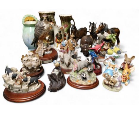 A Border Fine Art model, Badger Family, B0221;&nbsp; Tug of War, JH61;&nbsp; others;&nbsp; a Royal Doulton model, Peregrine F