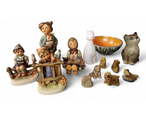 A Goebel figure, modelled by M I Hummell, signed, Happy Pastime, 9cm high, printed mark, 69;&nbsp; others, Brother, 95;&nbsp;