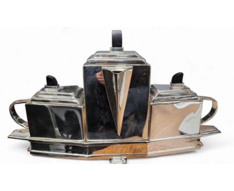 An Art Deco style three piece tea service, in the Christopher Dresser style,&nbsp;comprising teapot, milk jug and sucrier, fi