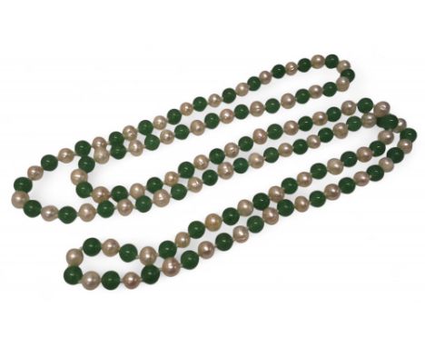 A jade and freshwater pearl necklace, each bead approx. 8mm dia.