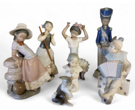 A Lladro figure, Boy with Accordion on Domino, No. 1179; others, Child Drummer, 1167;&nbsp; Angel Praying, 4538;&nbsp; &nbsp;