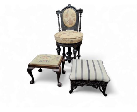 A cast iron low foot stool in the manner of Coalbrookdale, pinstriped overstuffed upholstered seat, 25cm x 37cm x 37cm;&nbsp;