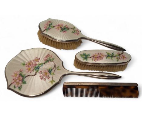 A silver and guilloche enamel backed four piece dressing table set, guilloche enamel white ground, hand painted apple blossom