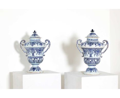 A pair of delftware blue and white vases and covers,second half of the 19th century, probably Rouen, each of baluster shape w