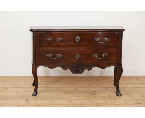 A dated Louis XV walnut commode,1768, the serpentine shaped top over two long drawers, with later brass handles and escutcheo