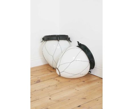 A pair of large opaline glass carbon-arc lanterns,early 20th century, each with a painted metal corona and a mesh casing to t
