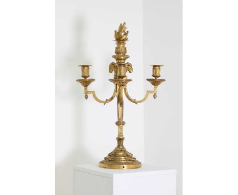 A fine ormolu five-light candelabrum,in the Louis XVI taste, late 19th century, with a flambeau finial, each branch surmounte