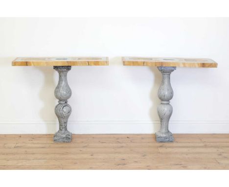 A pair of shallow console tables,each rectangular top incorporating 18th century pietra dura panels within Sienna marble bord