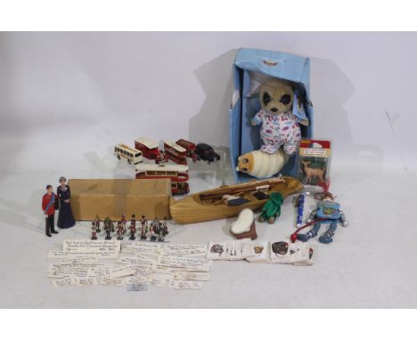 A lot to to include 12 x white metal hand painted military figures mostly by PMD Ltd. A boxed Meerkovo soft toy. Military Hea