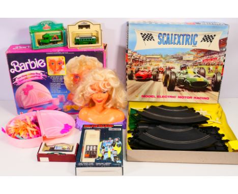 Scalextric, Barbie, maxim - A mixed lot of boxed toys to include: Scalextric set 30 with two cars. Barbie Colour Change Head,