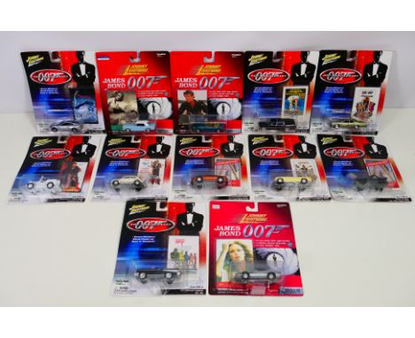 Johnny Lightning - James Bond - A group of carded models including Aston Martin Vanquish, Volkswagen Beetle, Cadillac Hearse,